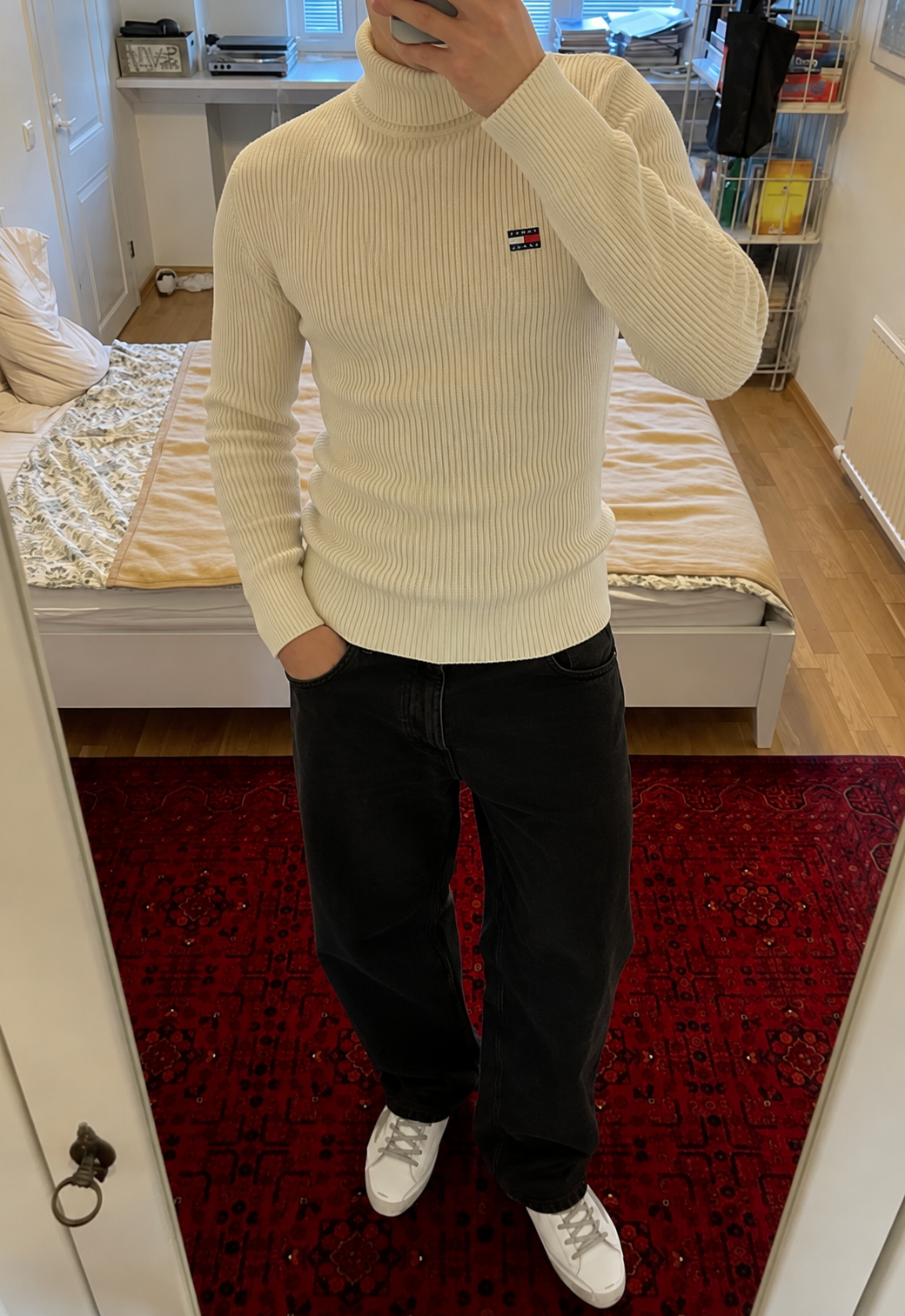 Cliente con maglione Strive Outfit